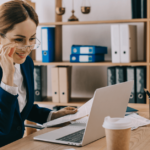 smiling-female-lawyer-looking-at-laptop-screen-at-HSCX97S-1-1080×628